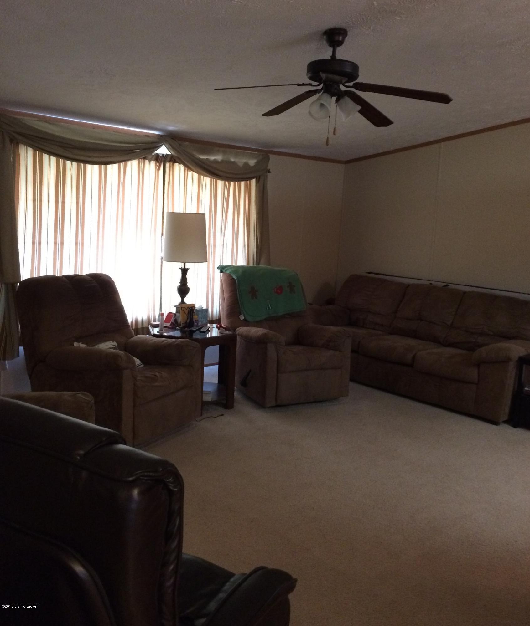 662 Nolin Park Road Clarkson, KY 42726 - Photo 15 of 15 LARGE FAMILY ROOM WITH BUILT IN TV UNIT.