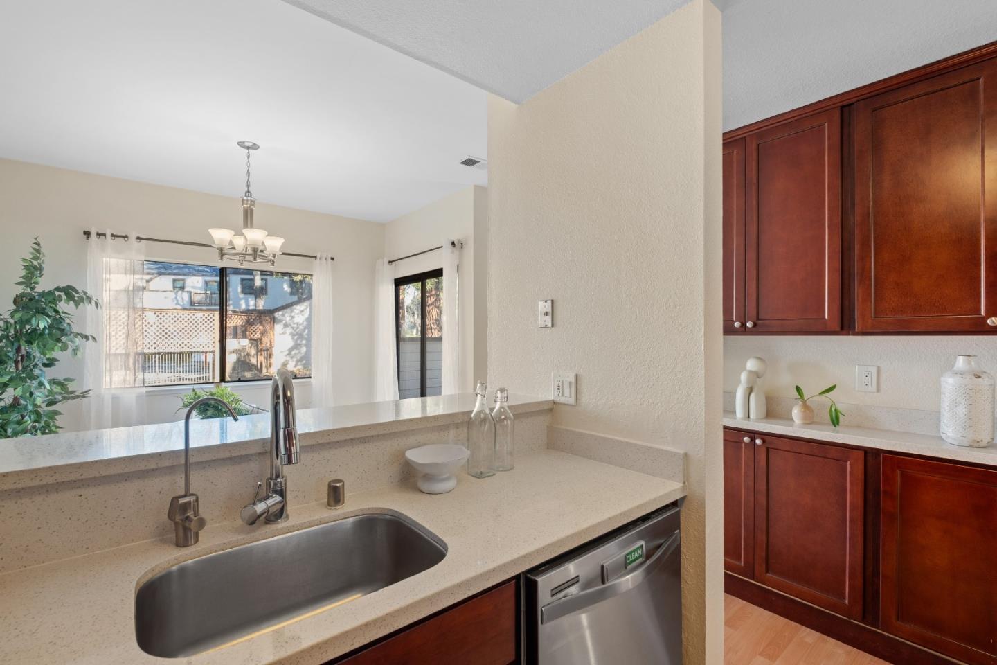 1392 Meadow Ridge Circle San Jose, CA 95131 - Photo 18 of 43 a bathroom with a sink and a mirror