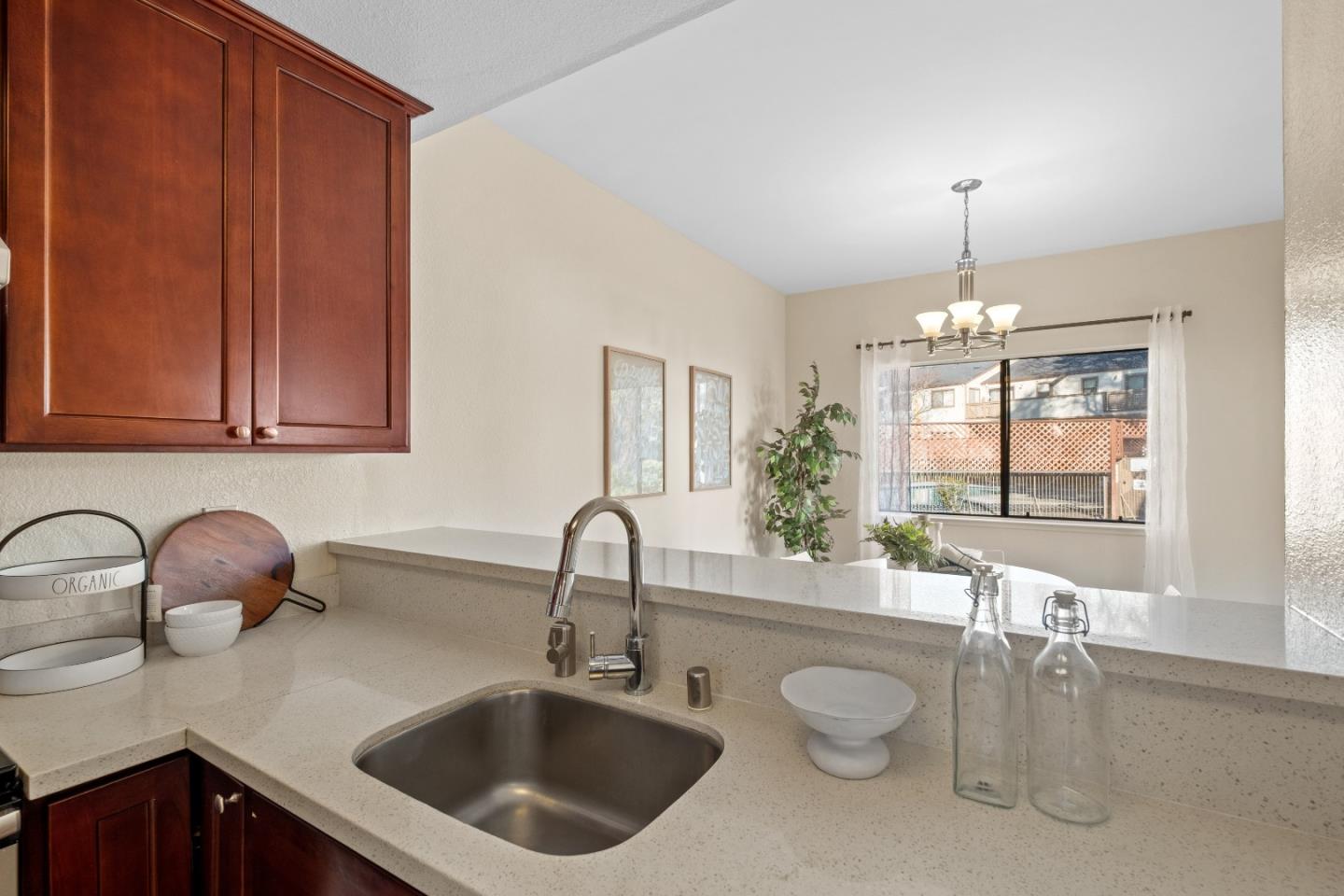 1392 Meadow Ridge Circle San Jose, CA 95131 - Photo 19 of 43 a kitchen with a sink and a large window