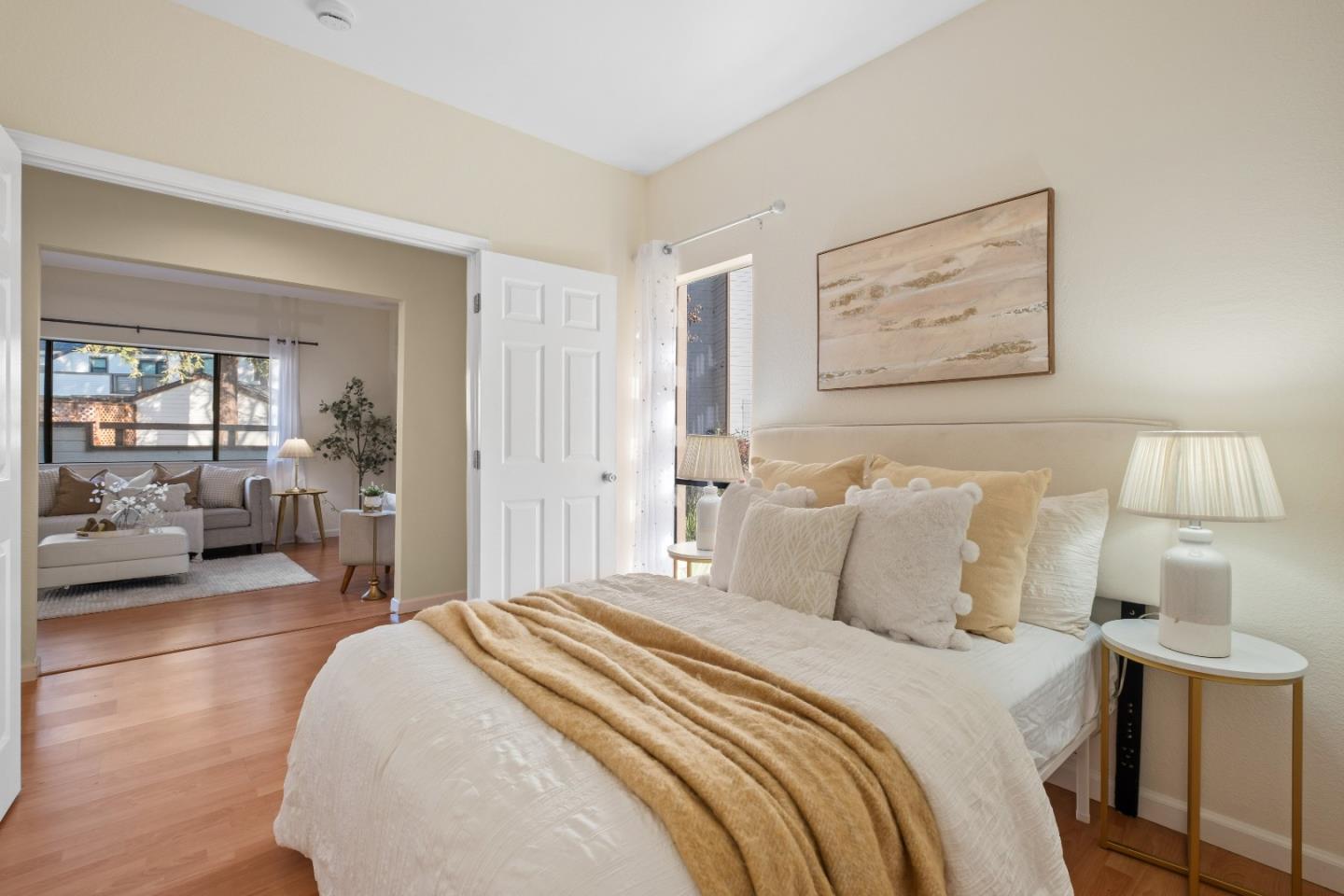 1392 Meadow Ridge Circle San Jose, CA 95131 - Photo 25 of 43 a bedroom with a large bed couch and a window