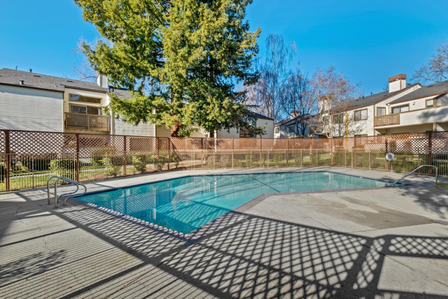 1392 Meadow Ridge Circle San Jose, CA 95131 - Photo 32 of 43 a view of a backyard with a patio