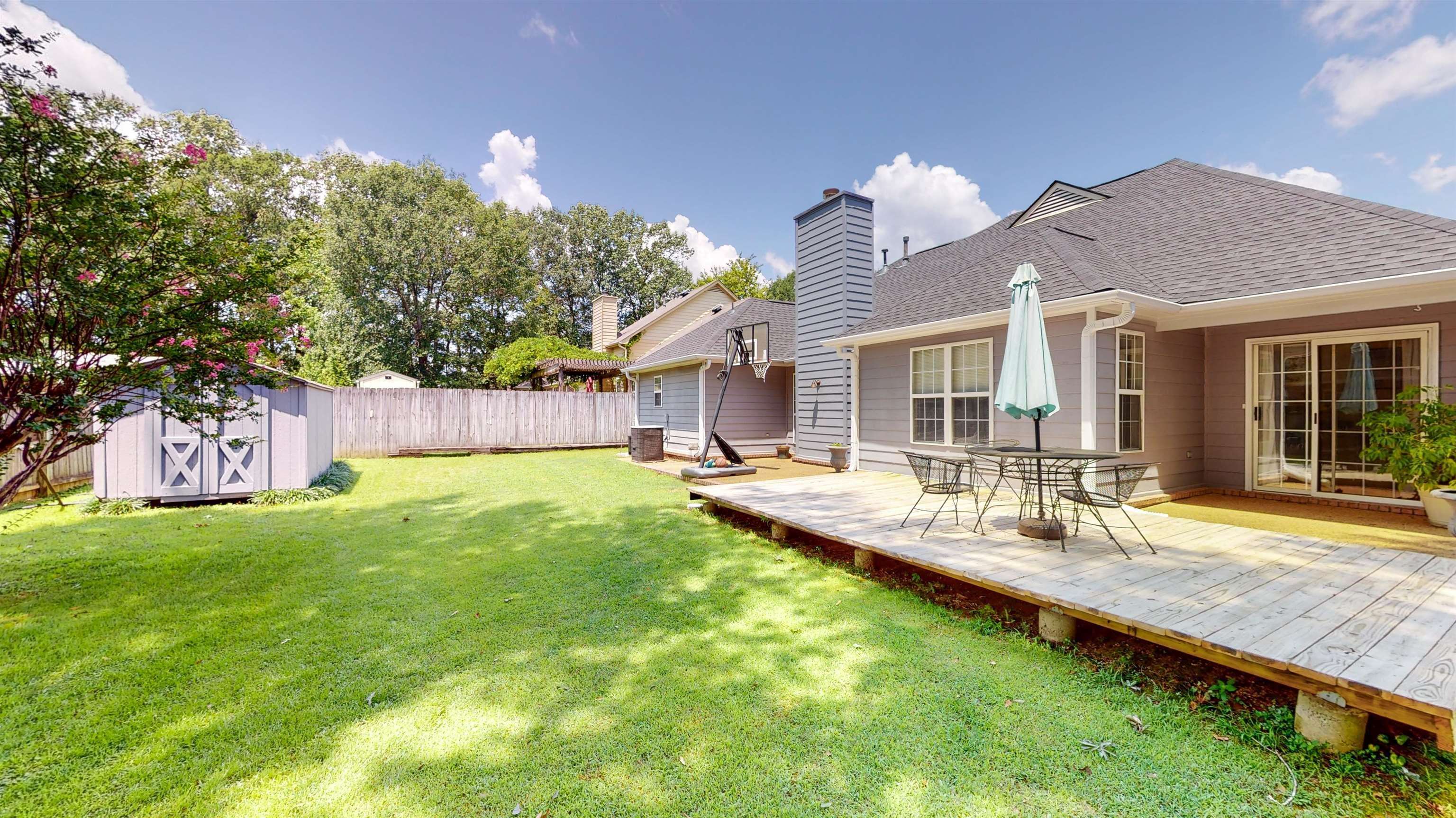 195 Cross Point Drive Collierville, TN 38017 - Photo 11 of 11 a view of a house with backyard and sitting area