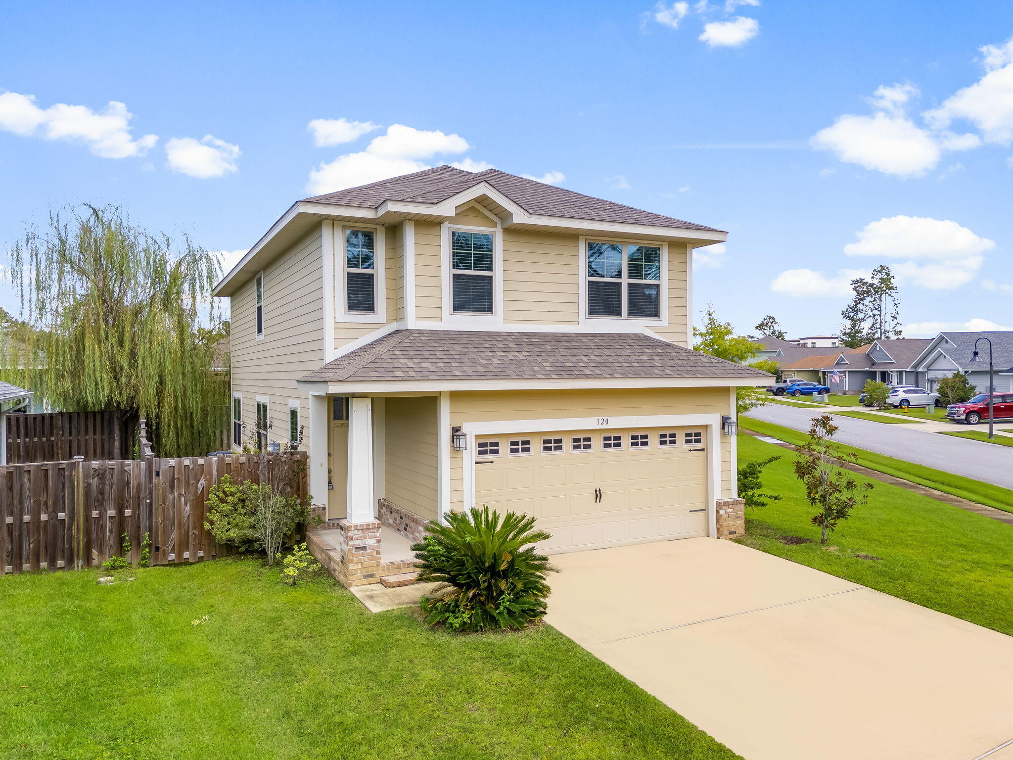 a view of a house with a yard