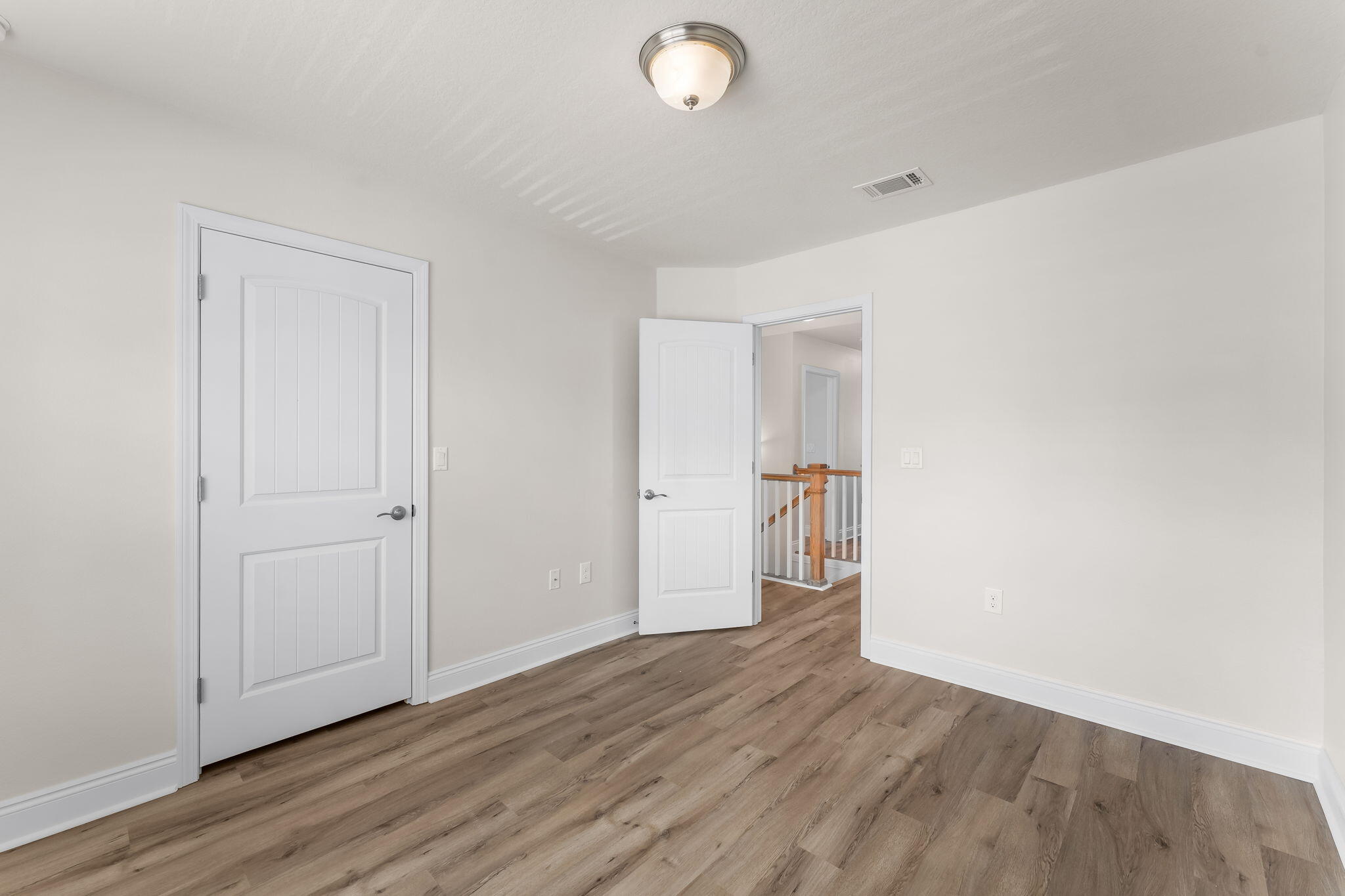 120 Brandywine Road Freeport, FL 32439 - Photo 16 of 29 a view of empty room with wooden floor