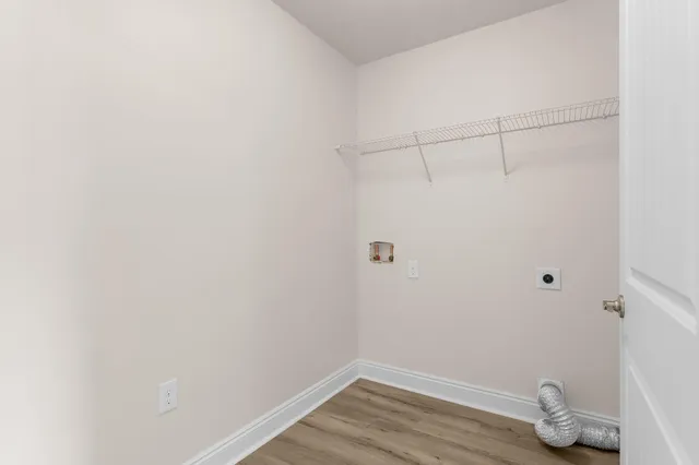 a view of small space with empty racks on the wall