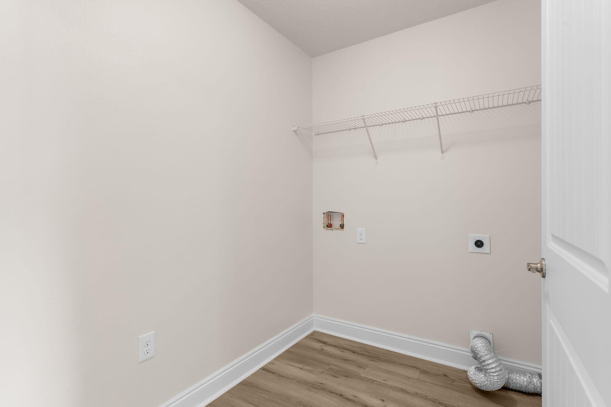 120 Brandywine Road Freeport, FL 32439 - Photo 18 of 29 a view of small space with empty racks on the wall