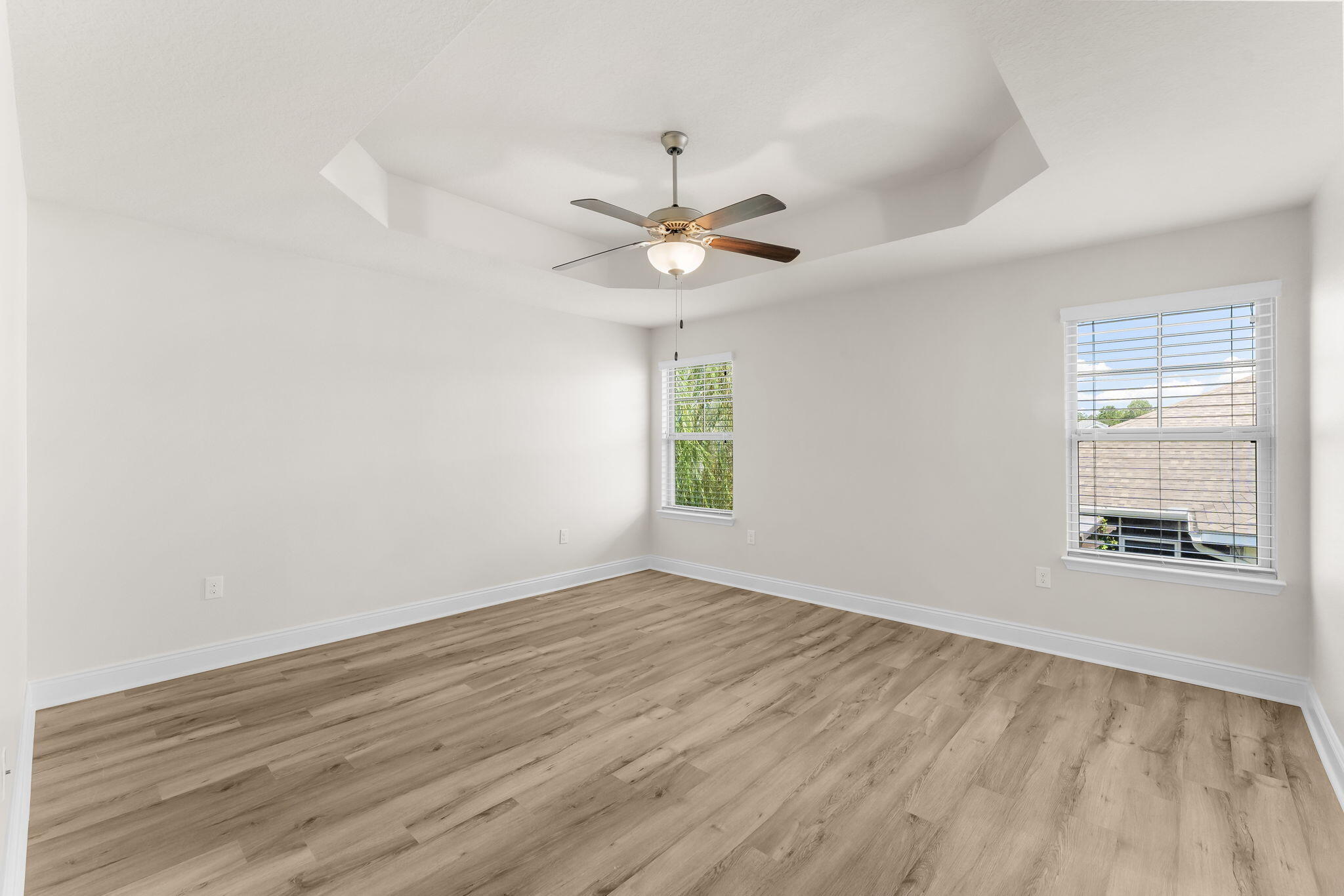 120 Brandywine Road Freeport, FL 32439 - Photo 22 of 29 wooden floor in an empty room with a window