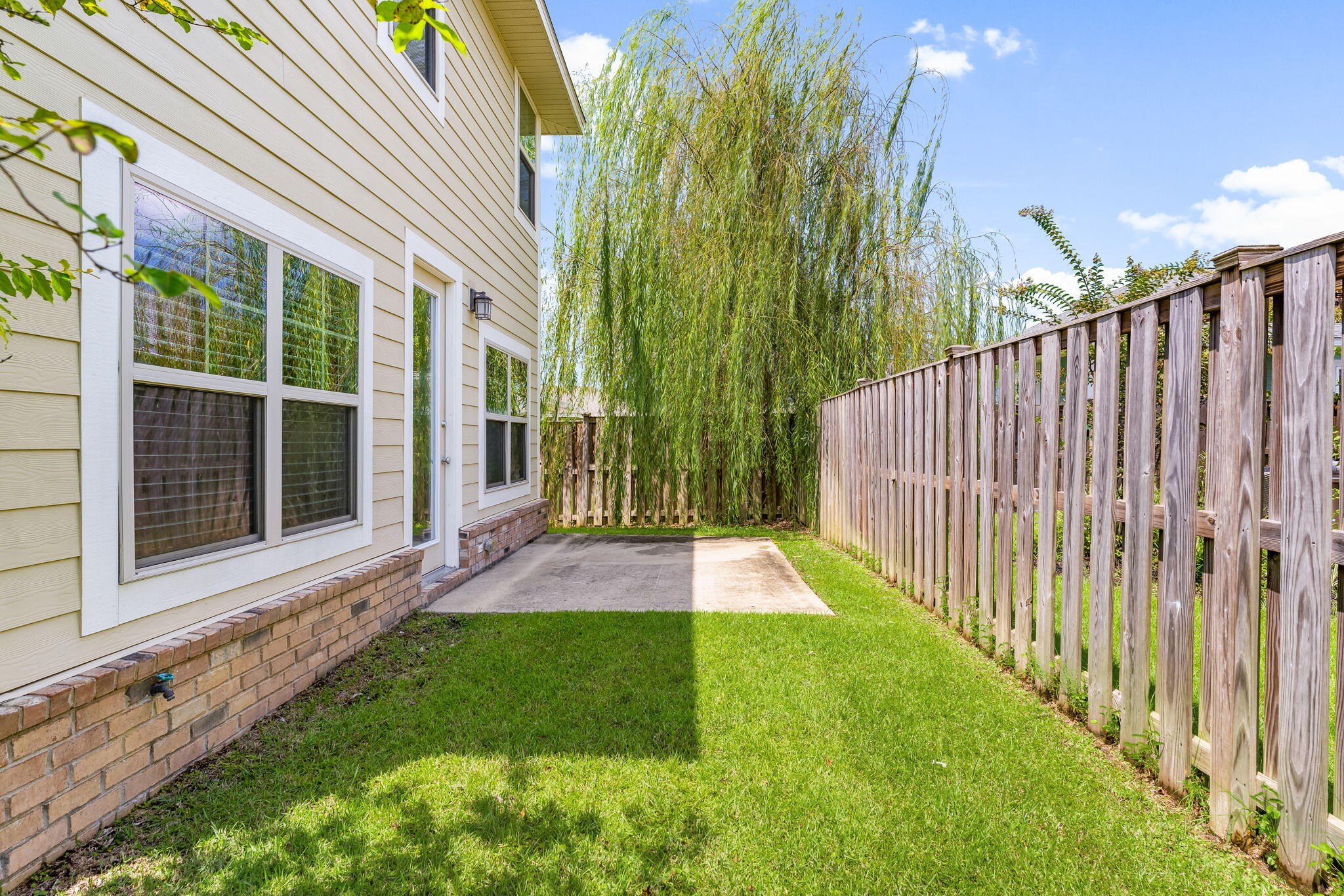 120 Brandywine Road Freeport, FL 32439 - Photo 27 of 29 a view of yard with small cabin and wooden floor