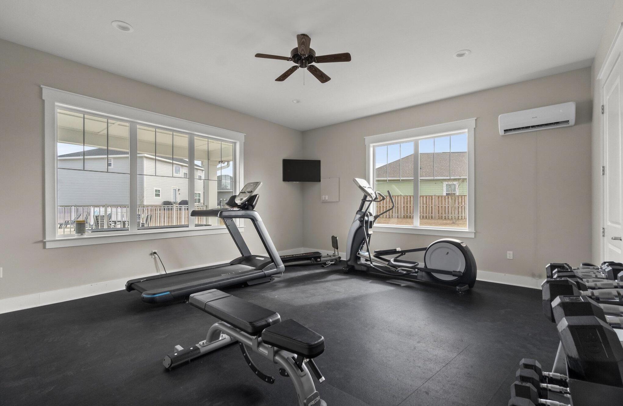 120 Brandywine Road Freeport, FL 32439 - Photo 5 of 29 a room with gym equipment and a window