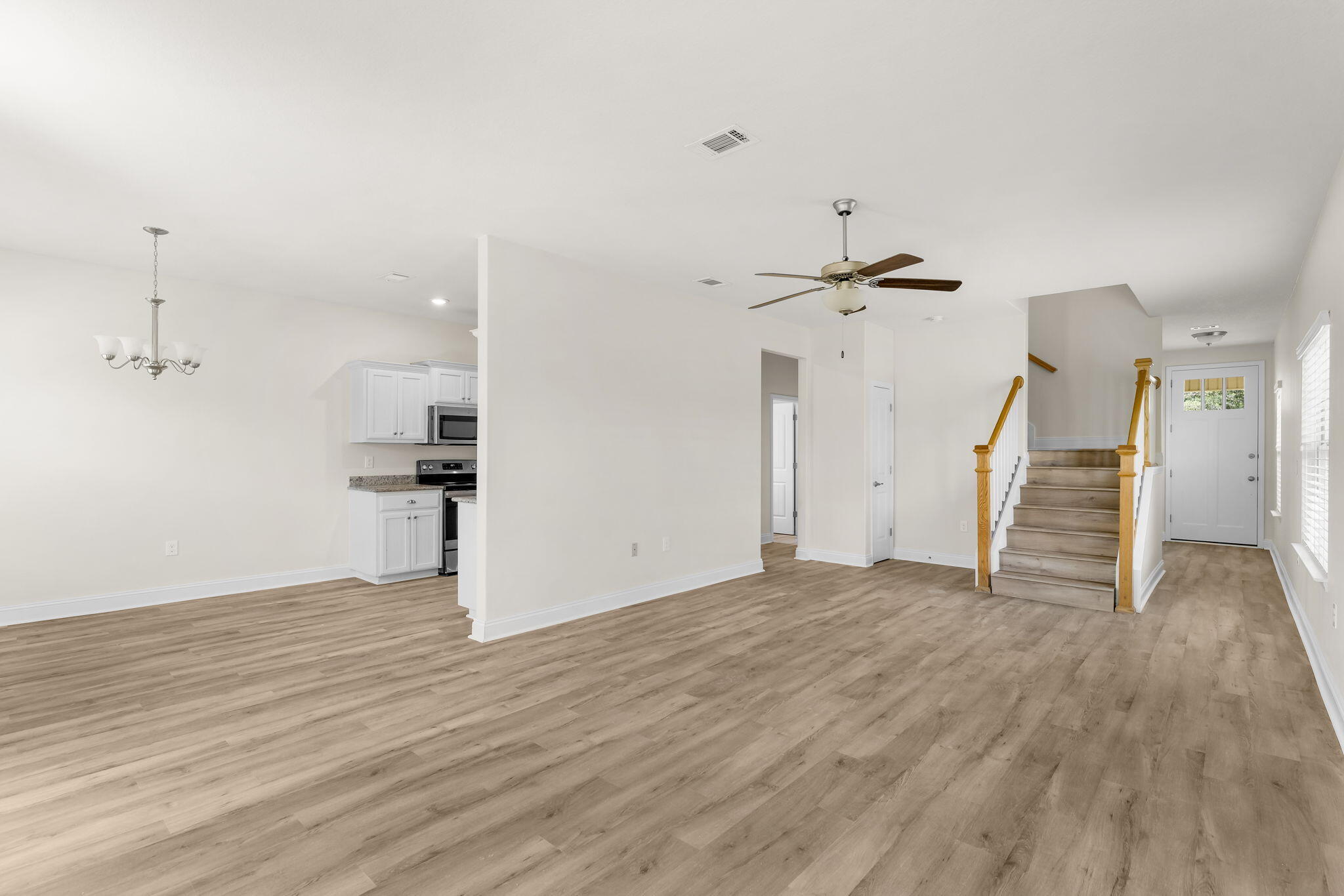 120 Brandywine Road Freeport, FL 32439 - Photo 9 of 29 a view of empty room with wooden floor