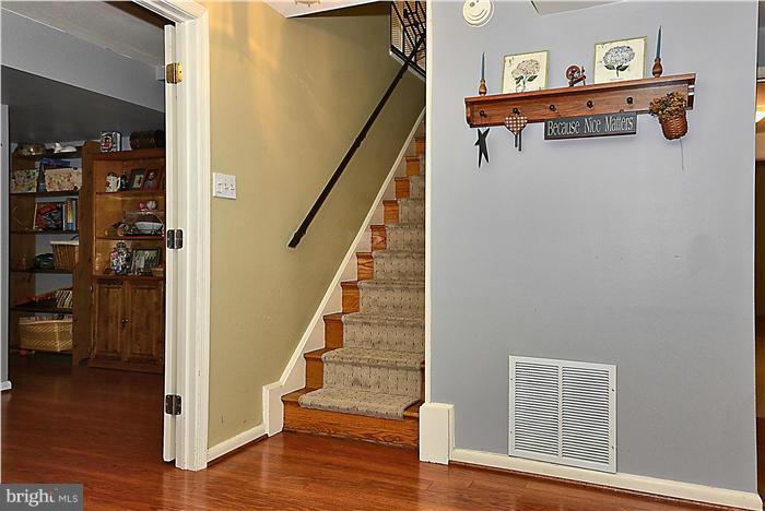 10804 Margate Road Silver Spring, MD 20901 - Photo 18 of 30 a view of entryway and hall with wooden floor