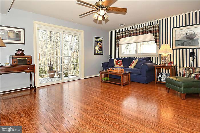 10804 Margate Road Silver Spring, MD 20901 - Photo 20 of 30 a living room with furniture and a large window