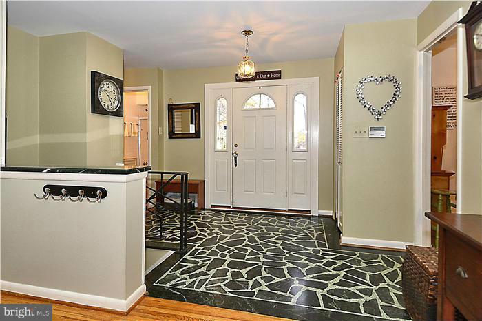 10804 Margate Road Silver Spring, MD 20901 - Photo 3 of 30 a bathroom with a glass door shower and a sink