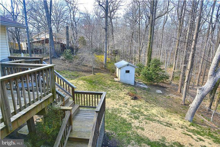 10804 Margate Road Silver Spring, MD 20901 - Photo 30 of 30 a view of balcony with wooden floor and outdoor seating
