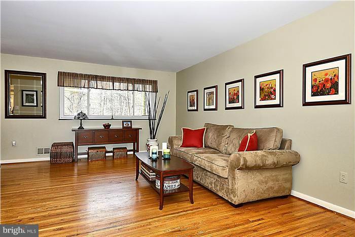 10804 Margate Road Silver Spring, MD 20901 - Photo 4 of 30 a living room with furniture and wooden floor