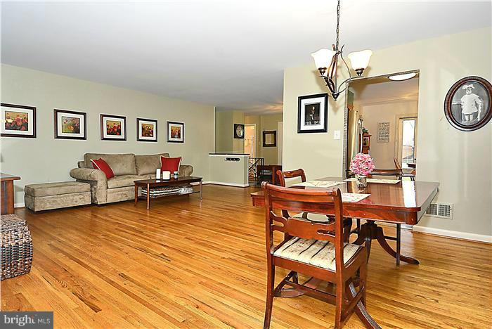 10804 Margate Road Silver Spring, MD 20901 - Photo 6 of 30 a living room with furniture a window and wooden floor