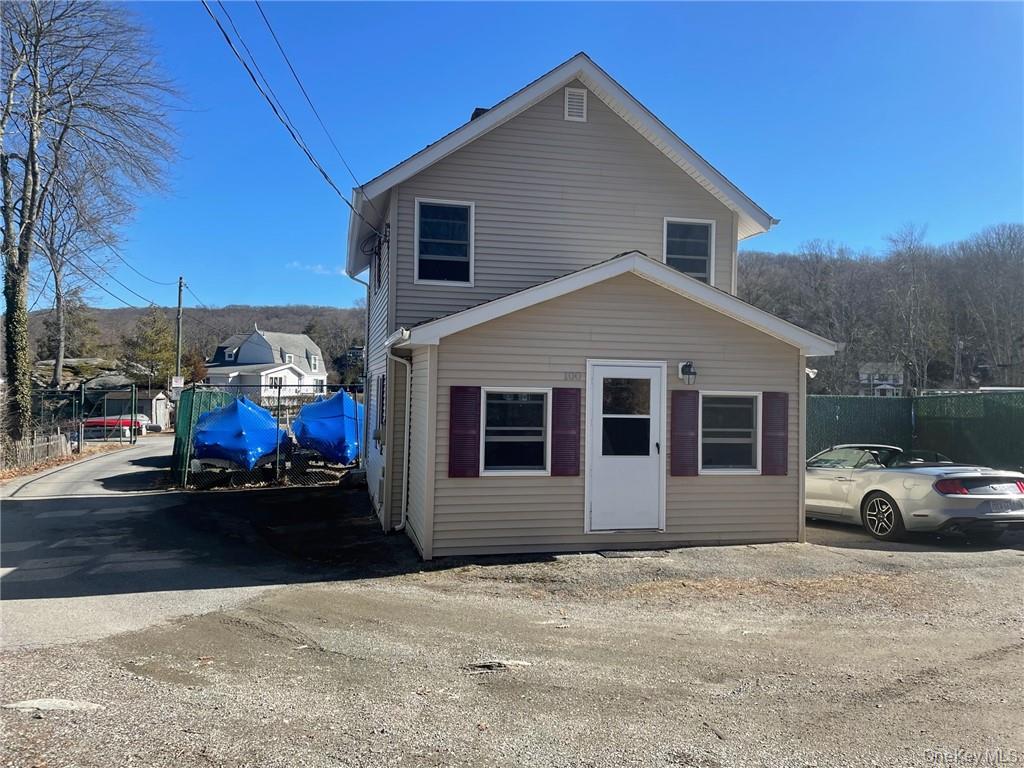 100 Dunderberg Road Putnam Valley, NY 10579 - Photo 7 of 29 a front view of a house with cars parked