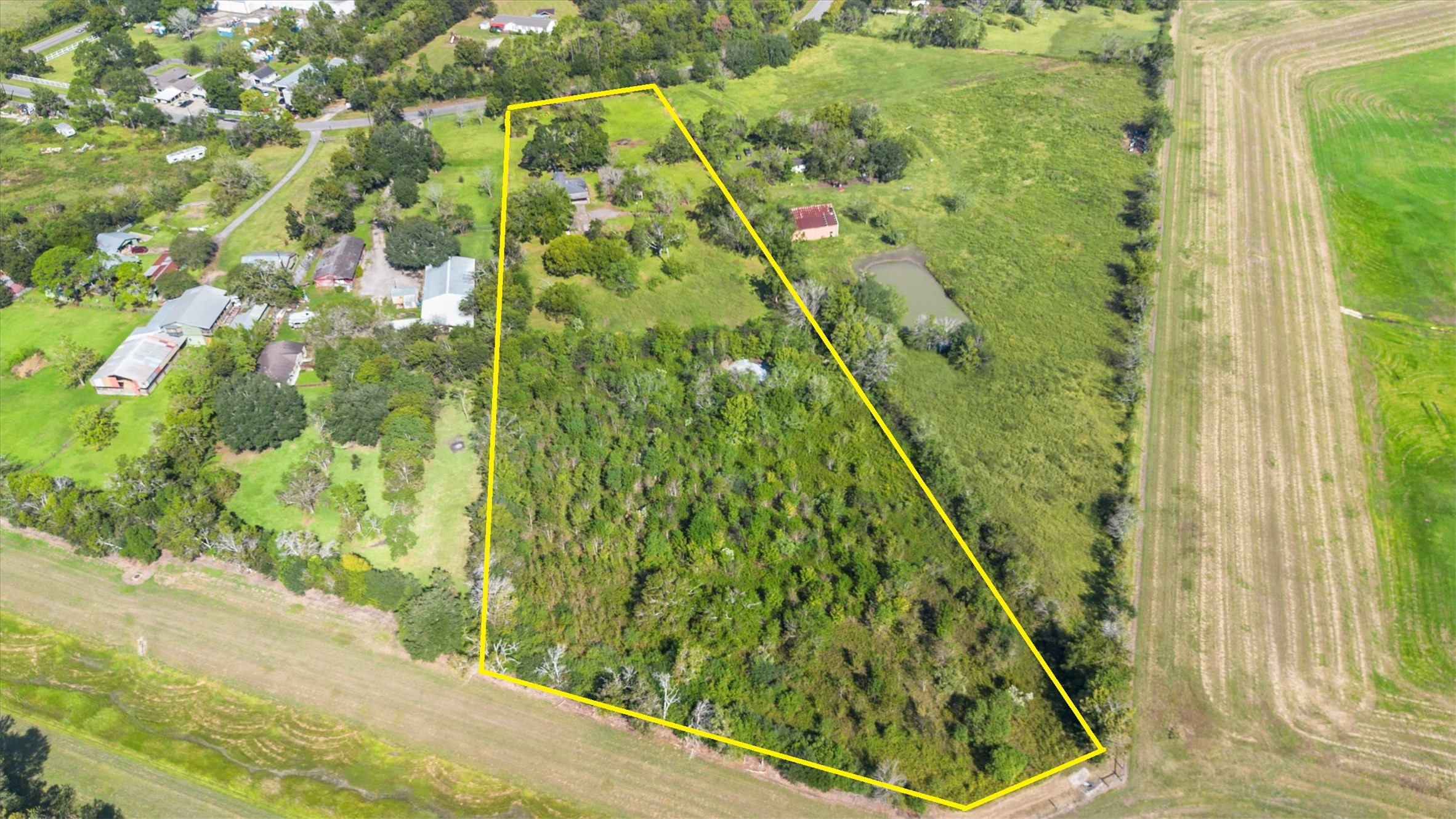 18111 Roy Long Road Pearland, TX 77584 - Photo 2 of 36 This image clearly defines the generous acreage included with the property — ideal for outdoor living, gardening, livestock, or future expansion.