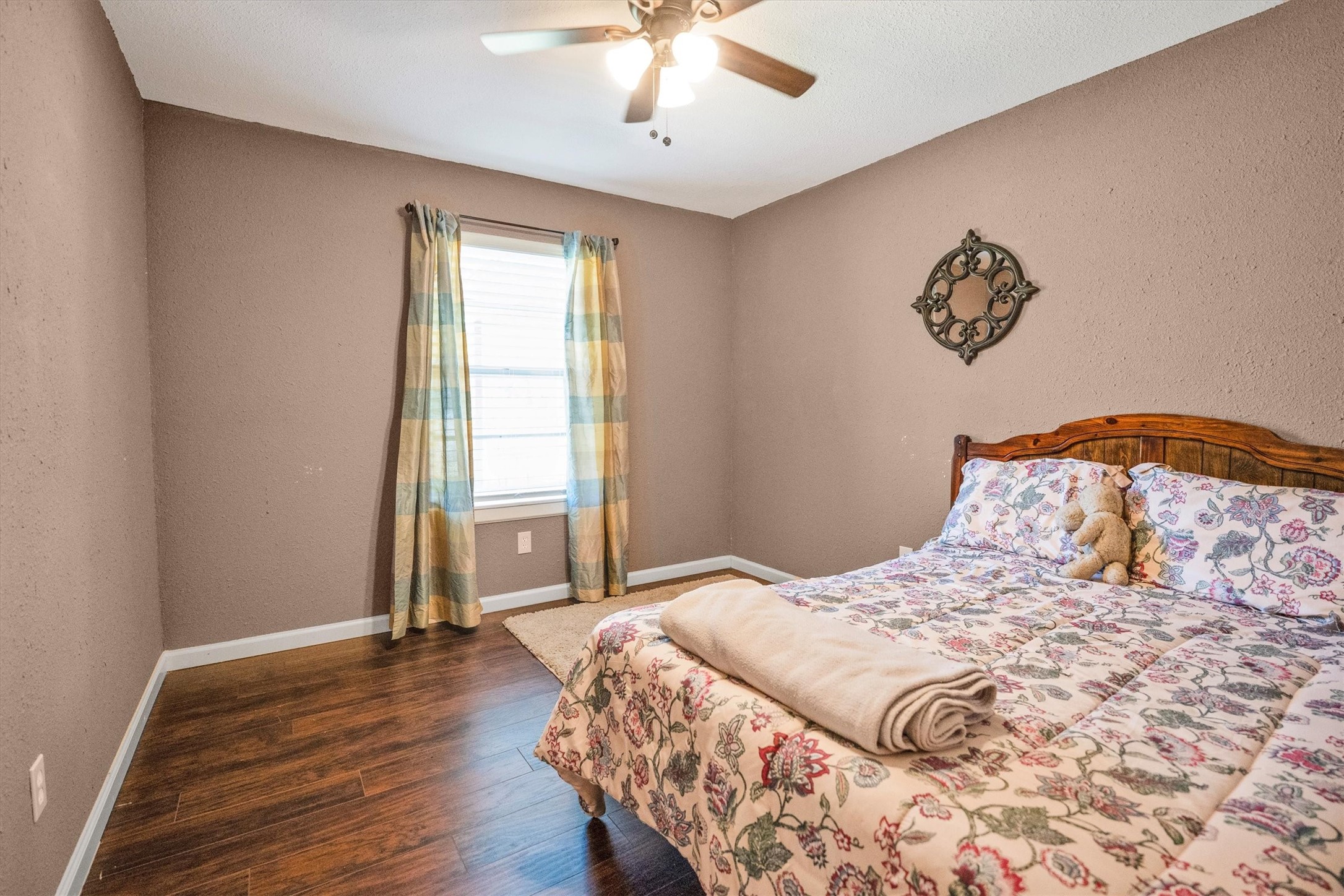 18111 Roy Long Road Pearland, TX 77584 - Photo 27 of 36 A bright, cheerful room with wood-style floors and a homey feel—perfect for a guest room, nursery, or creative space.