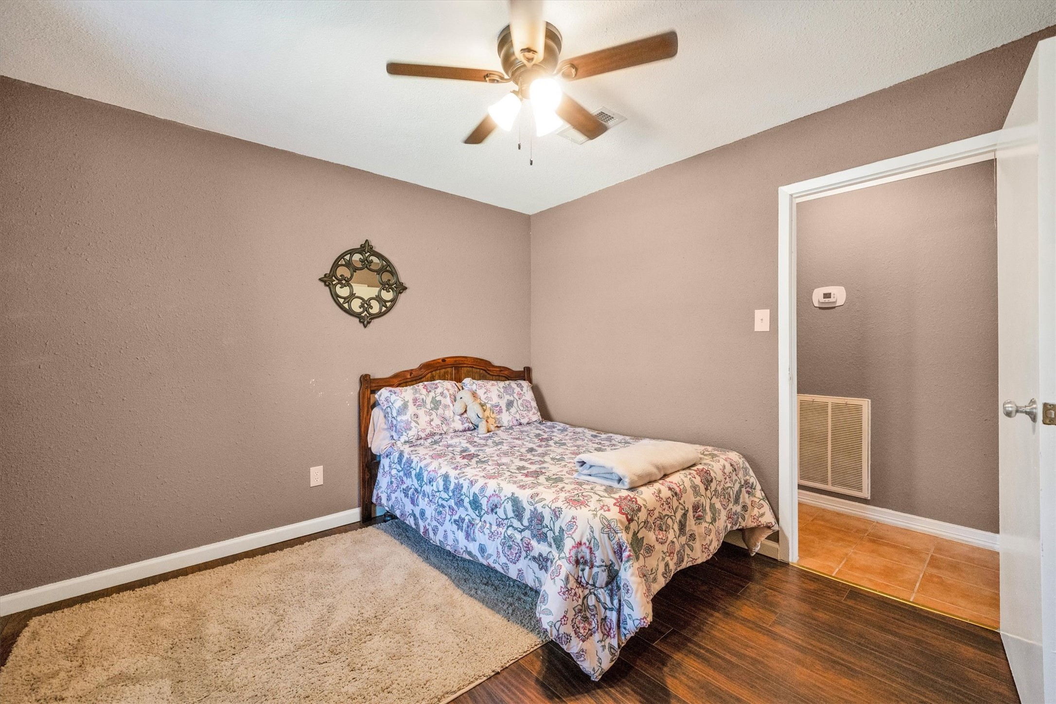 18111 Roy Long Road Pearland, TX 77584 - Photo 28 of 36 Cozy and inviting, this room’s simple charm and gentle light make it feel instantly comfortable.