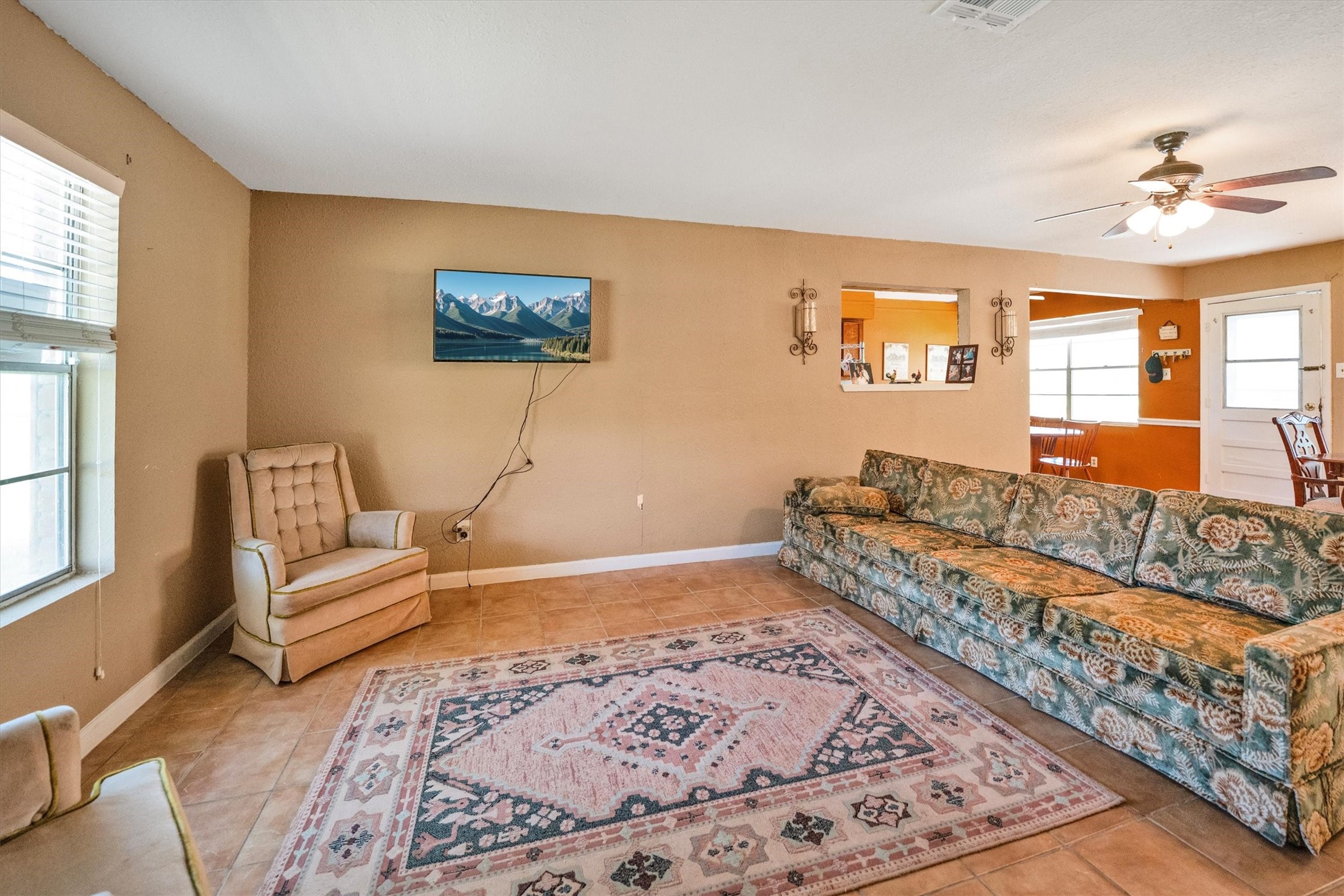 18111 Roy Long Road Pearland, TX 77584 - Photo 8 of 36 A large picture window brightens the space while offering a peaceful view of the outdoors.