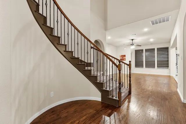 a view of entryway with wooden floor