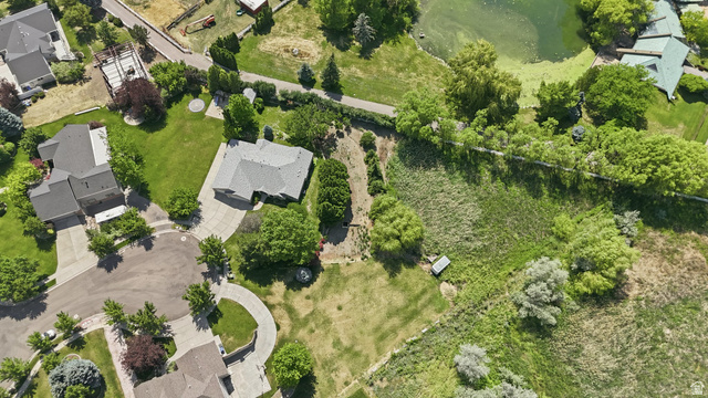 2190 750 West Perry, UT 84302 - Photo 36 of 42 Residential property situated on a cul-de-sac with surrounding green space, mature trees, a private driveway, and a spacious lot