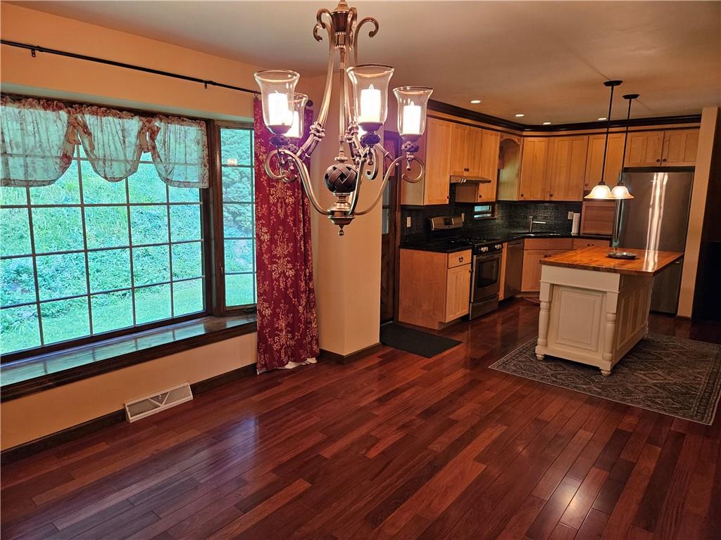 207 College Lodge Road Indiana, PA 15701 - Photo 11 of 36 a dining room with large window with outer view
