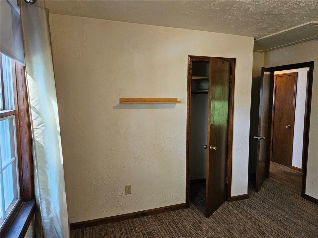 207 College Lodge Road Indiana, PA 15701 - Photo 22 of 36 a view of a hallway with wooden floor