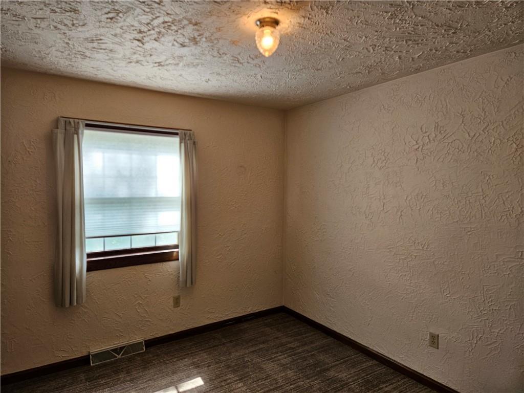 207 College Lodge Road Indiana, PA 15701 - Photo 23 of 36 a view of an empty room with a window