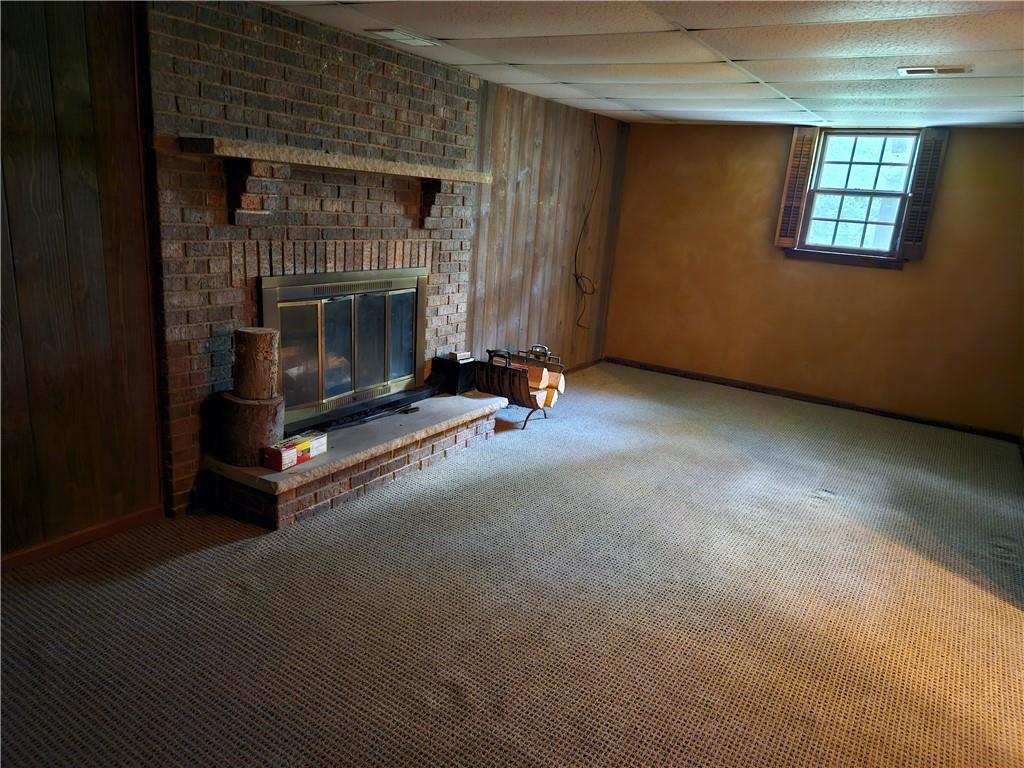 207 College Lodge Road Indiana, PA 15701 - Photo 27 of 36 a living room with furniture window and a fireplace