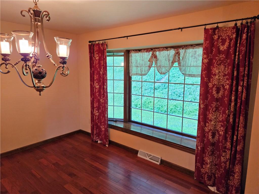 207 College Lodge Road Indiana, PA 15701 - Photo 10 of 36 a view of a room with wooden floor and windows