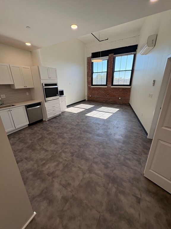 151 Chestnut Street, Unit 413 Springfield, MA 01103 - Photo 4 of 11 a view of a kitchen with a sink