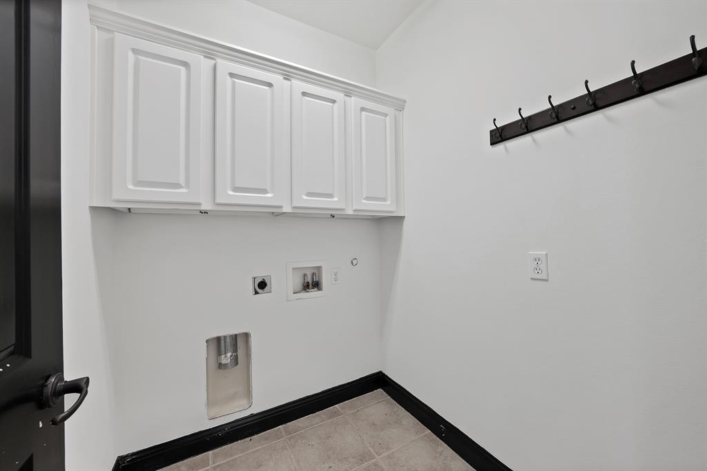 5747 Prospect Avenue, Unit B Dallas, TX 75206 - Photo 25 of 39 a view of storage and utility room with washer and dryer