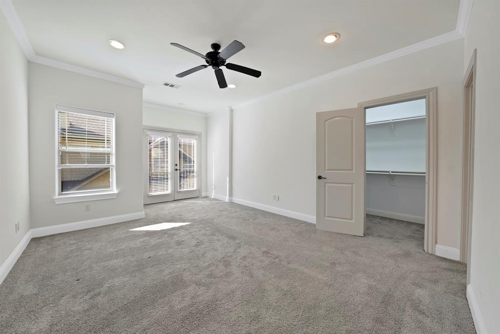 5747 Prospect Avenue, Unit B Dallas, TX 75206 - Photo 27 of 40 a view of empty room with windows and ceiling fan