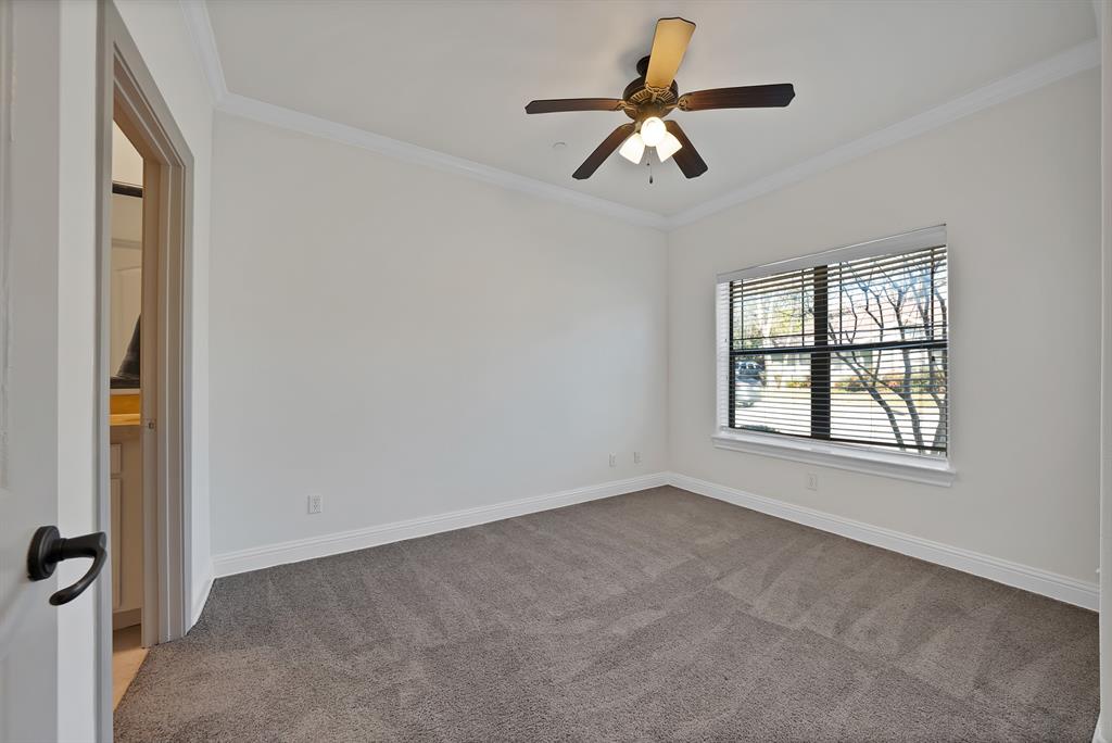 5747 Prospect Avenue, Unit B Dallas, TX 75206 - Photo 4 of 40 an empty room with windows and fan