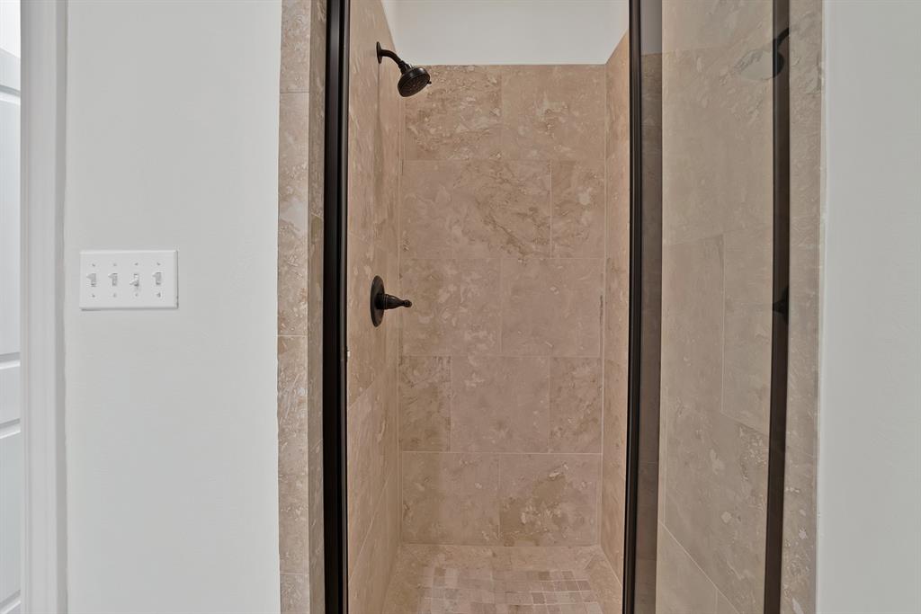 5747 Prospect Avenue, Unit B Dallas, TX 75206 - Photo 9 of 40 a bathroom with a shower