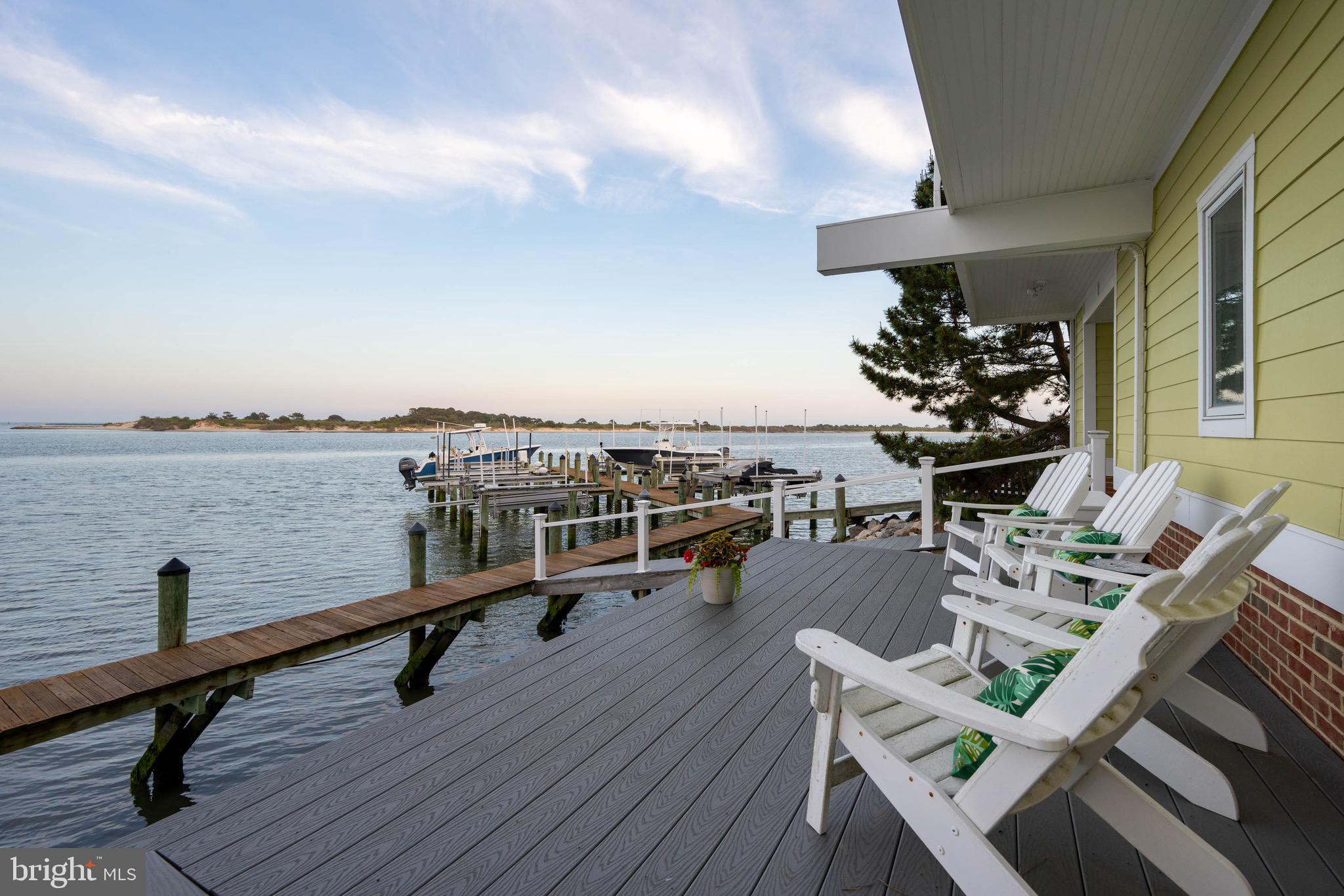 12959 Harbor Road Ocean City, MD 21842 - Photo 79 of 85 a view of a terrace with furniture
