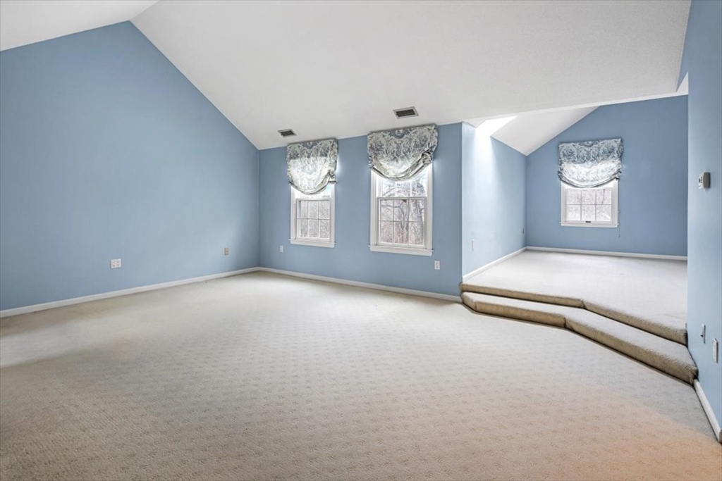 74 Thistle Patch Way, Unit 74 Hingham, MA 02043 - Photo 11 of 22 an empty room with windows