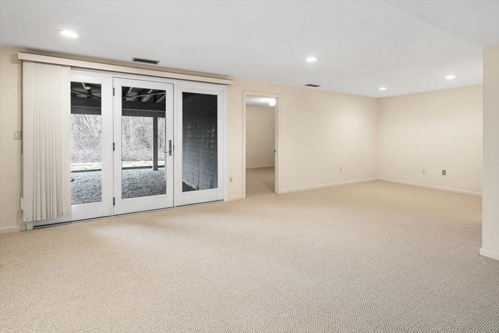 74 Thistle Patch Way, Unit 74 Hingham, MA 02043 - Photo 16 of 22 a view of empty room with wooden floor