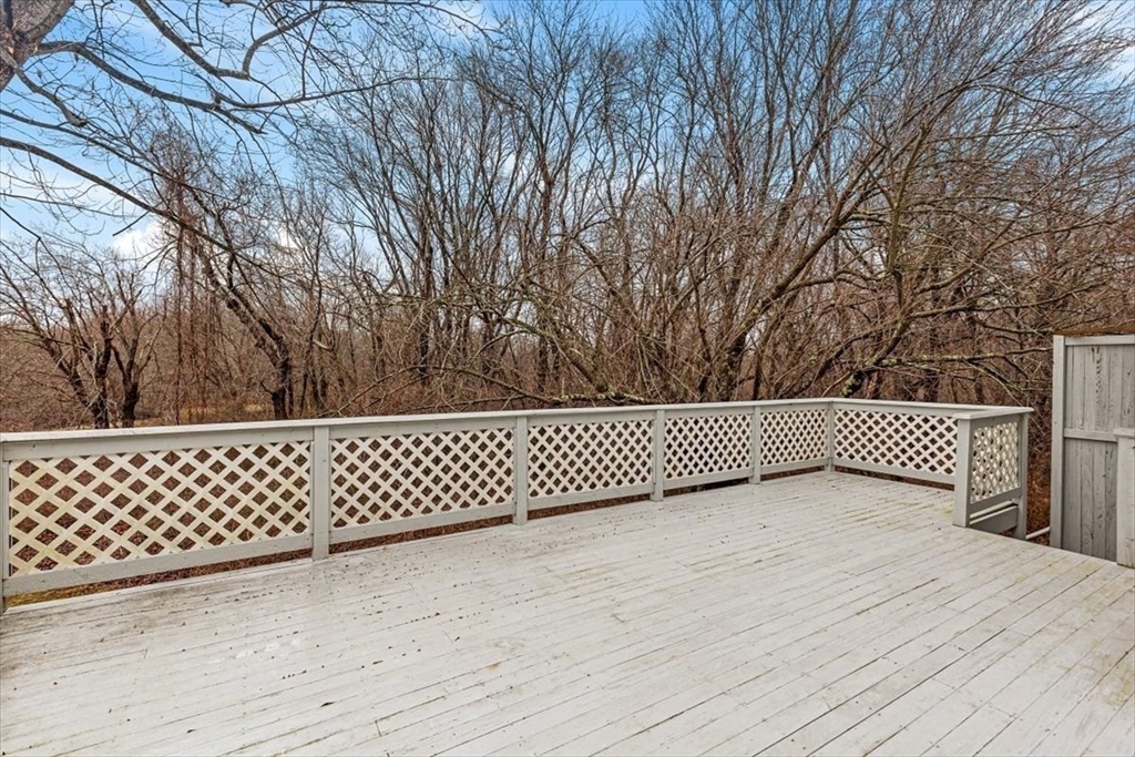 74 Thistle Patch Way, Unit 74 Hingham, MA 02043 - Photo 20 of 22 a view of a wooden fence