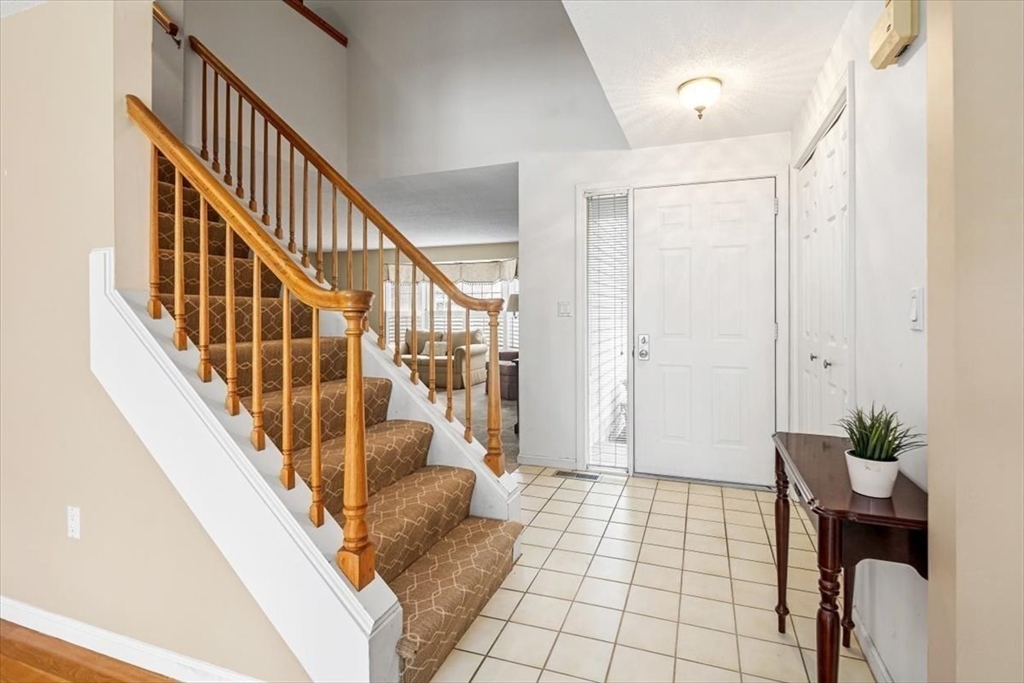 74 Thistle Patch Way, Unit 74 Hingham, MA 02043 - Photo 9 of 22 a view of entryway with wooden floor