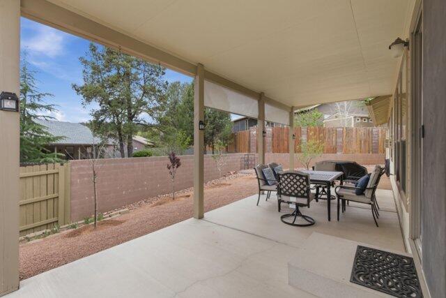 722 Boulder Ridge Road Payson, AZ 85541 - Photo 17 of 29 a view of a patio with table and chairs