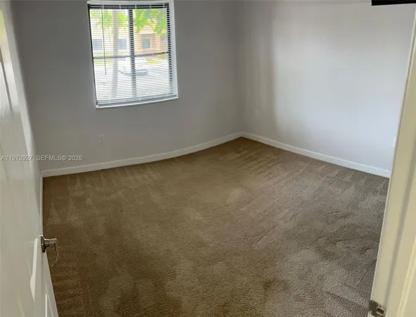 an empty room with a window
