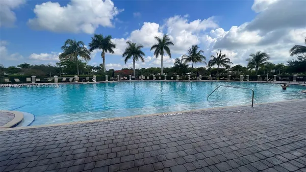 a view of a lake with a yard