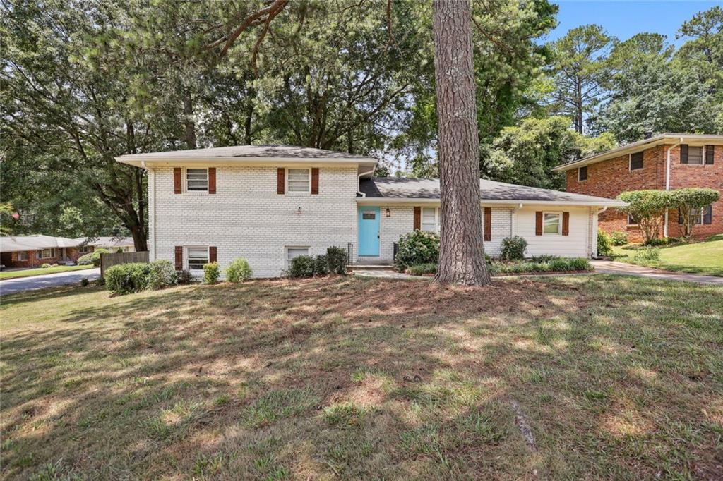 2281 Del Ray Court Decatur, GA 30032 - Photo 1 of 1 a view of a house with backyard and trees