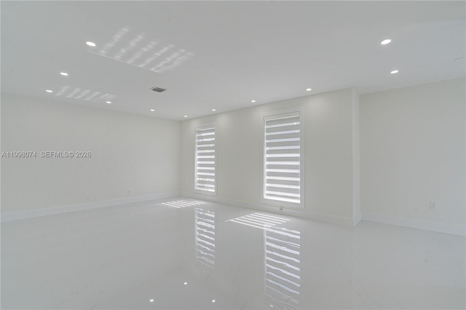 Pinecrest Pinecrest, FL 33156 - Photo 4 of 9 a view of an empty room with a window