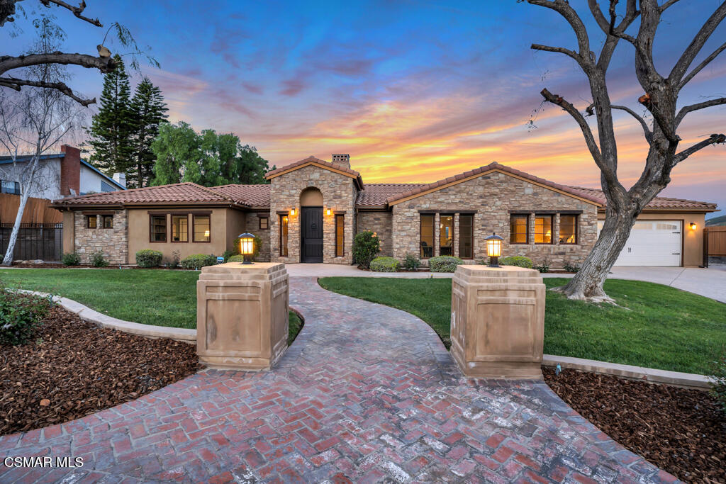 a view of house with a outdoor space
