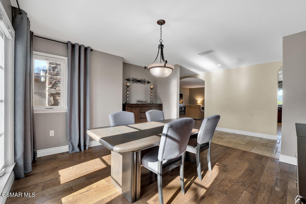1660 San Rafael Way Camarillo, CA 93012 - Photo 19 of 63 a view of a dining room with furniture and wooden floor