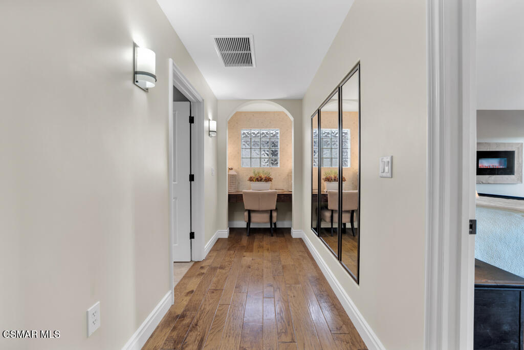 1660 San Rafael Way Camarillo, CA 93012 - Photo 28 of 63 a view of a hallway with wooden floor windows and livingroom